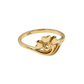 Gold ring with a heart design on a white background