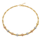 Gold, rose gold, and silver beaded necklace on a white background