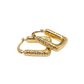 Gold hoop earrings with textured design on a white background