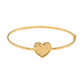 Gold bracelet with a heart-shaped clasp on a white background