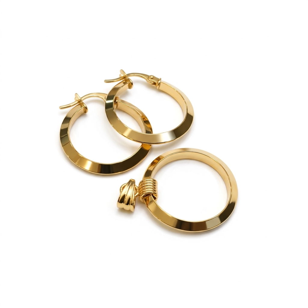 Gold hoop earrings on a white background