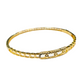 Gold bracelet on a white background