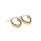 Gold hoop earrings on a white background