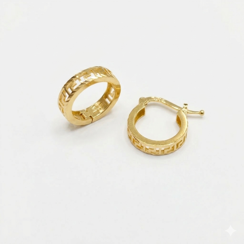 Gold hoop earrings on a white background