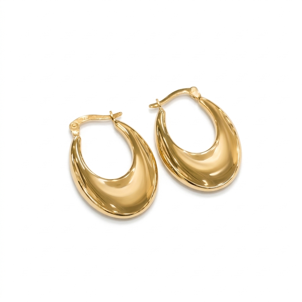 Gold hoop earrings on a white background