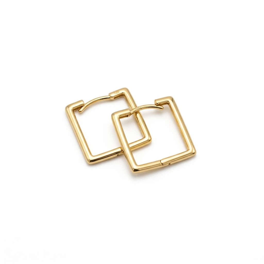 Gold hoop earrings on a white background