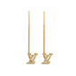 Gold earrings with 'V' design on a white background