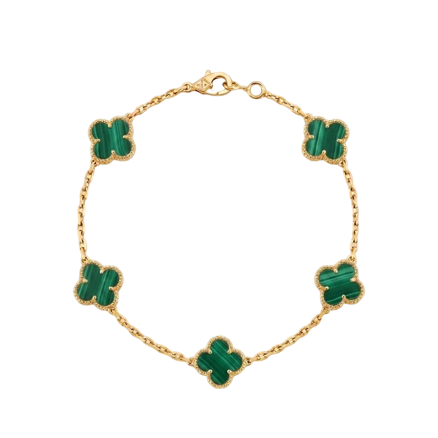 Gold bracelet with green clover-shaped stones on a white background