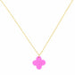 Necklace with a pink clover-shaped pendant on a gold chain against a white background