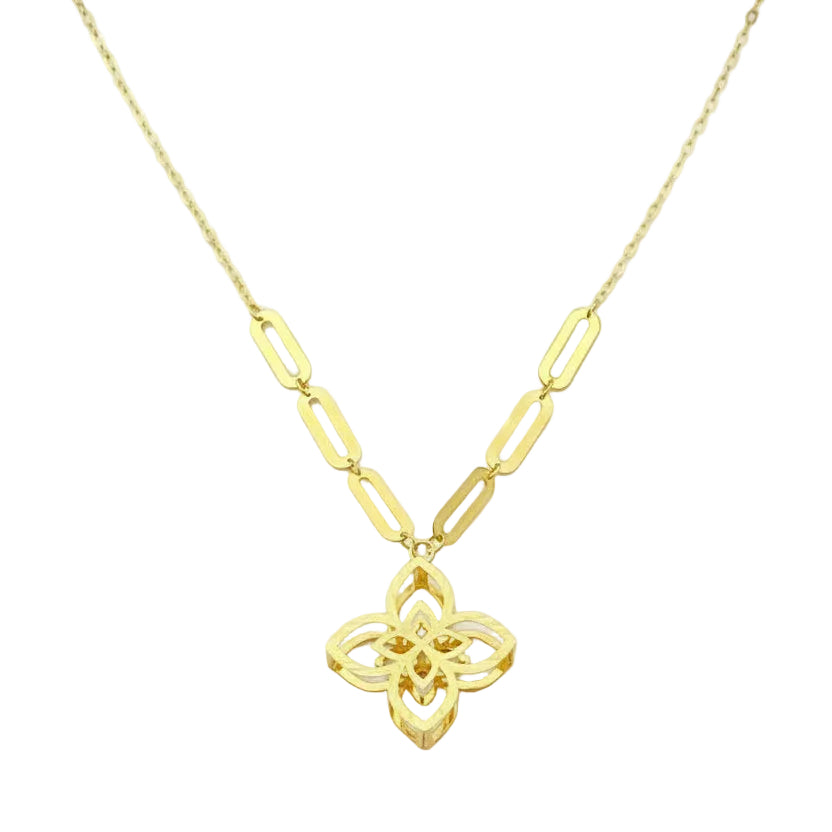 Gold necklace with a floral pendant on a white background