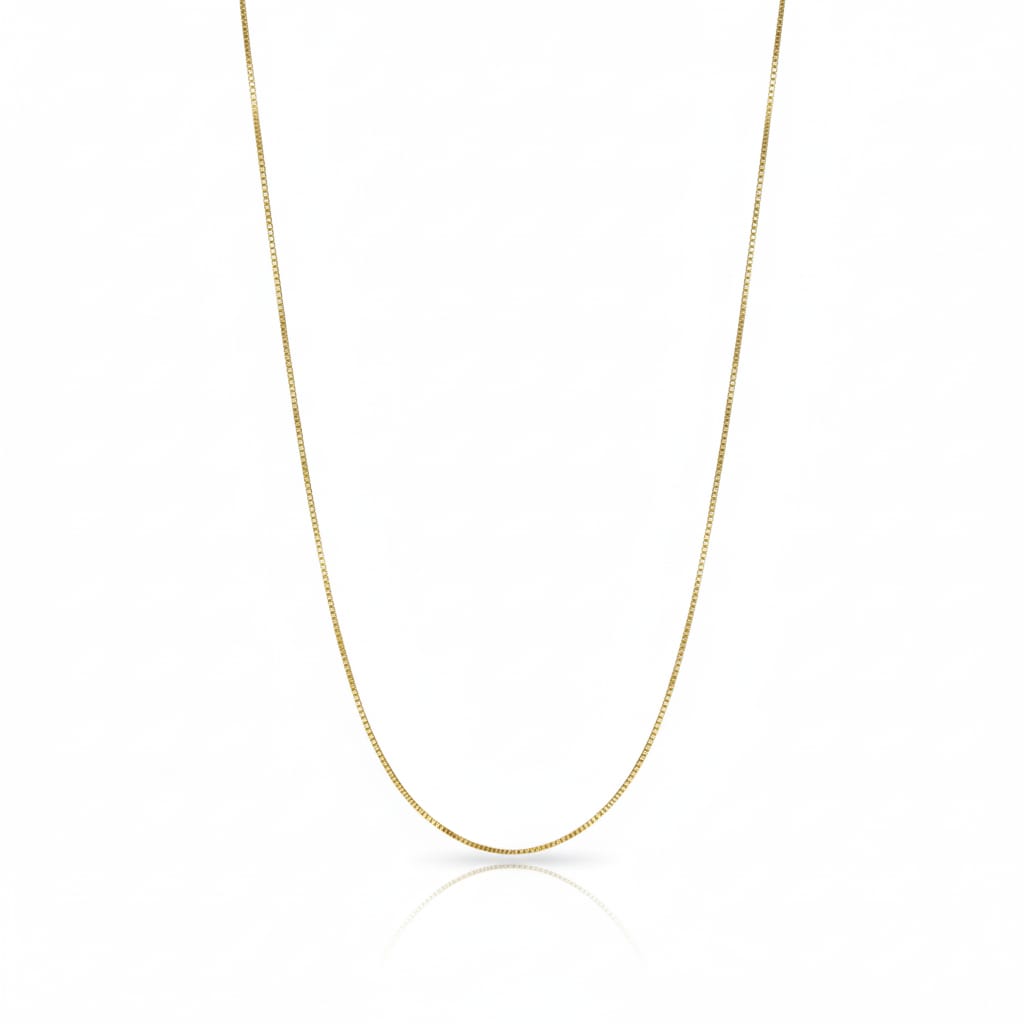 Gold chain necklace on a white background