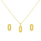 Gold necklace with matching earrings on a white background