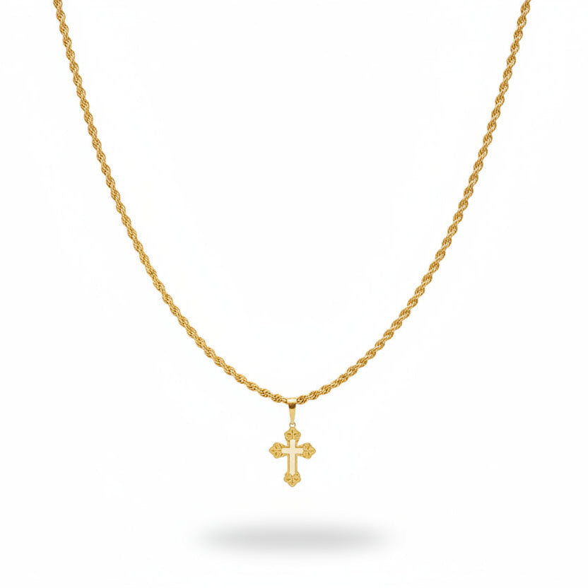 Gold necklace with cross pendant on a black velvet stand
