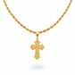 Gold necklace with a cross pendant on a black bust against a beige background