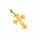 Gold cross pendant on a black background
