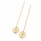 Gold earrings with floral designs on a white background