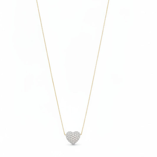 Necklace with a heart-shaped pearl pendant on a mannequin bust against a white background