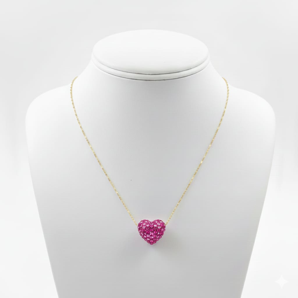 Necklace with a pink heart-shaped pendant on a mannequin bust against a white background