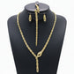 Gold necklace, bracelet, earrings, and ring set on a black mannequin with weight details.