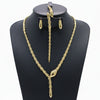 Gold necklace, bracelet, earrings, and ring set on a black mannequin with weight details.