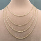 Gold chain necklace on a mannequin with measurements displayed.