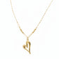Gold necklace with a heart pendant on a mannequin neck, showing weight and carbon dating information.