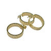 Gold hoop earrings with engraved design on a light gray background