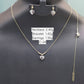 Jewelry set including necklace, bracelet, and earrings on a black mannequin with weight labels.
