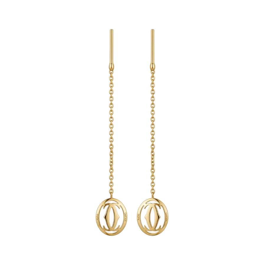 Gold earrings with chain designs on a white background