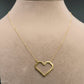 Necklace with a pixelated heart pendant on a mannequin neck, labeled with weight and code.