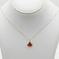 Necklace with a red pendant on a beige mannequin bust against a white background