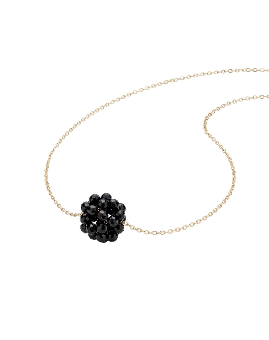 Necklace with a black floral pendant on a white background