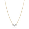 Gold necklace with three silver beads on a white background