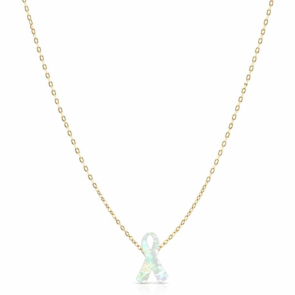 Necklace with a white ribbon pendant on a gold chain against a white background