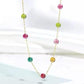 Necklace with colorful beads on a white background
