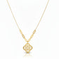 Gold necklace with a pendant on a blue mannequin