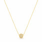Gold necklace with a round pendant on a white background