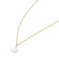 Gold necklace with a white butterfly pendant on a white background