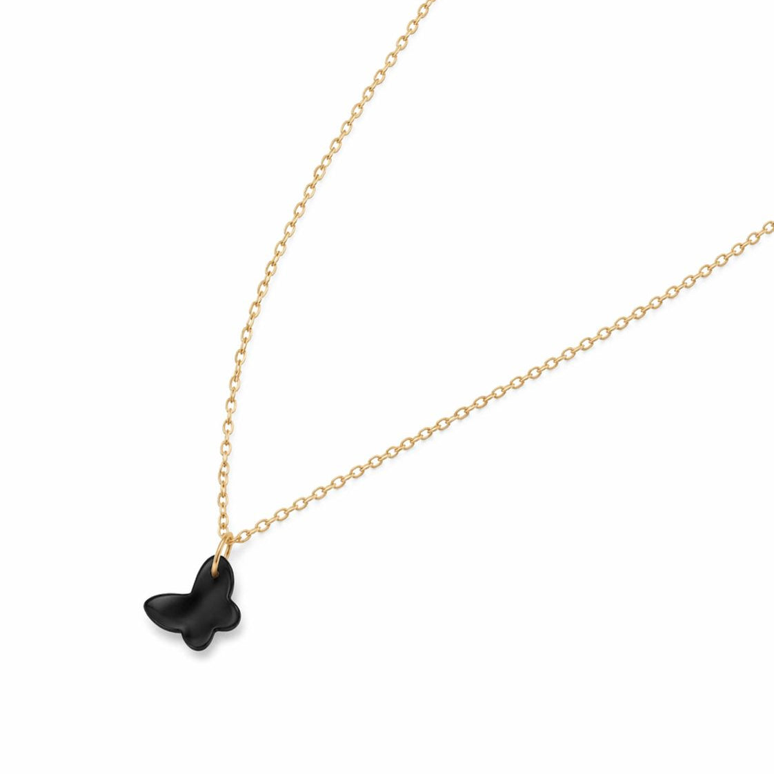 Black butterfly pendant on a gold chain against a white background