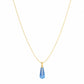 Gold necklace with a blue teardrop pendant on a white background