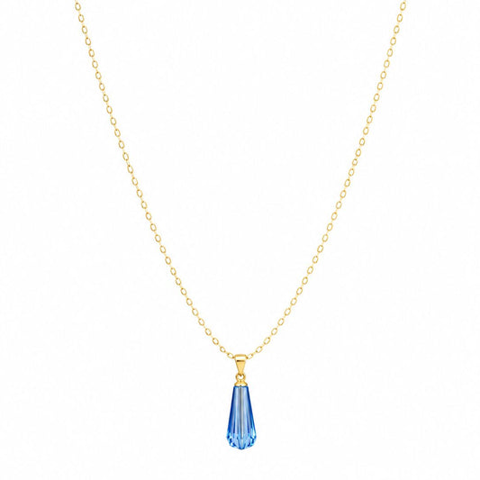 Gold necklace with a blue teardrop pendant on a white background
