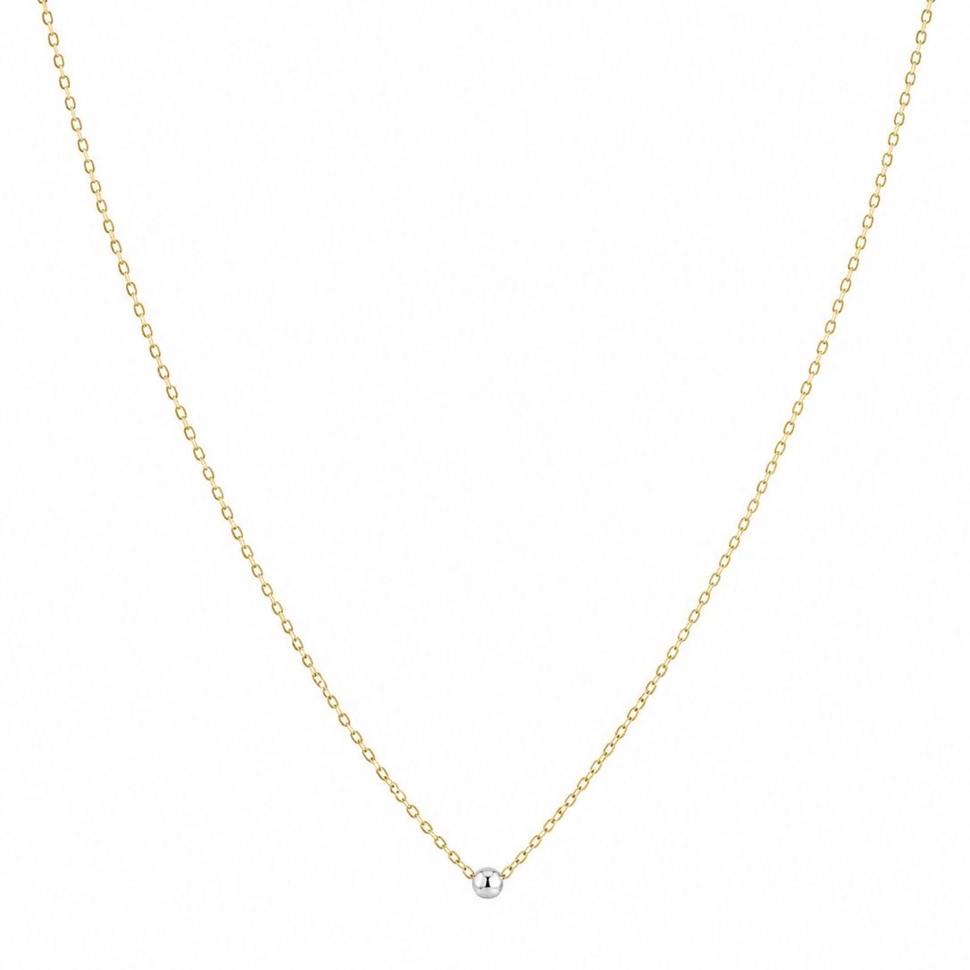Gold chain necklace on a white background
