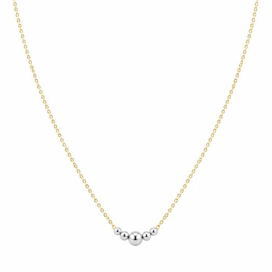 Gold necklace with two silver beads on a white background