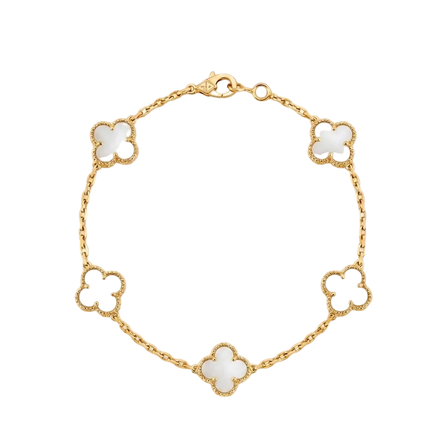 Gold bracelet with white clover-shaped charms on a white background