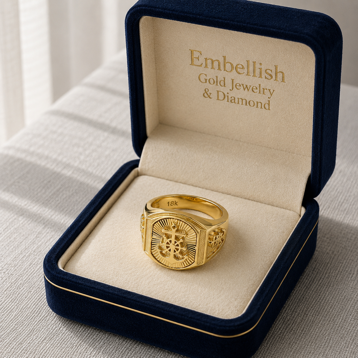 Gold ring in a jewelry box with 'Embellish Gold Jewelry & Diamond' branding.